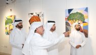 Katara General Manager, Prof. Dr. Khalid bin Ibrahim Al Sulaiti (second right) with other officials and artists during the inauguration of the exhibition.