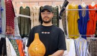 Amrou Mohamed with his gourd lamps.