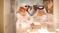 Minister of Municipality, H E Dr. Abdullah bin Abdulaziz bin Turki Al Subaie (front right); Minister of Justice, H E Masoud bin Mohammed Al Amri (middle right); Minister of Environment and Climate Change, H E Sheikh Dr. Faleh bin Nasser bin Ahmed bin Ali Al Thani (back), Minister of State and President of Qatar National Library, H E Hamad bin Abdulaziz Al Kuwari (front left) along with other officials during a tour of the exhibition.