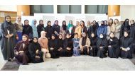 A group photo of participating students with research supervisors and professors.