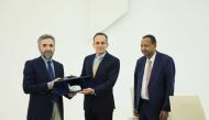 Officials of Hamad Bin Khalifa University and the United Nations Institute for Training and Research during the MoU signing. 