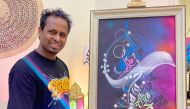 Calligrapher Abdul Kareem with his artwork. Pics: Salim Matramkot/The Peninsula