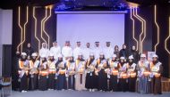 Ashghal officials with a group of students participating in the “Future Engineer” programme.