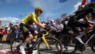 Jumbo-Visma's Danish rider Jonas Vingegaard wearing the overall leader's yellow jersey cycles in the ascent of the Petit Ballon in the final kilometres of the 20th stage of the 110th edition of the Tour de France cycling race 133 km between Belfort and Le Markstein Fellering, in Eastern France, on July 22, 2023. Photo by Thomas SAMSON / AFP