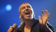 Irish pop singer Sinead O'Connor performs during the 37th International Celtic Festival in Lorient, western France on August 5, 2007. (Photo by Fred TANNEAU / AFP)
