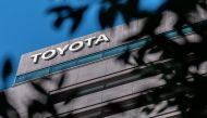 This picture taken on October 31, 2022 shows the logo of Toyota Motor being displayed atop the company's head office in Tokyo. Photo by Yuichi YAMAZAKI / AFP