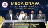 Officials during the Shop and Win Draw.