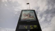 A street thermometer reads 45 degrees Celsius during a heatwave in Cordoba, southern Spain on August 8, 2023. (Photo by Jorge Guerrero / AFP)
 