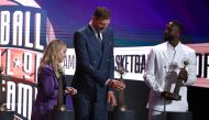 2023 inductees Becky Hammon, Dirk Nowitzki and Dwyane Wade react on stage during the 2023 Naismith Basketball Hall of Fame Induction at Symphony Hall on August 12, 2023 in Springfield, Massachusetts. (Photo by Mike Lawrie / GETTY IMAGES NORTH AMERICA / Getty Images via AFP)
