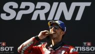 Ducati Lenovo Team Italian rider Francesco Bagnaia celebrates with his medal on the podium after winning the sprint race at the Red Bull Ring race track in Spielberg, Austria on August 19, 2023, ahead of the MotoGP Austrian Grand Prix. (Photo by ERWIN SCHERIAU / APA / AFP) / Austria OUT
