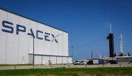 A SpaceX Falcon 9 rocket with the Crew Dragon spacecraft sits on Launch Complex 39A after its launch was scrubbed at the Kennedy Space Center on August 25, 2023 in Cape Canaveral, Florida. (Photo by Eva Marie Uzcategui / Getty Images via AFP)