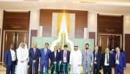 Officials of Qatar Table Tennis Association pose for a photograph with International Table Tennis Federation officials.