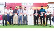 Officials with winners during a lucky draw at Lulu Hypermarket.