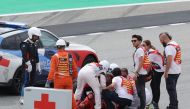 Ducati Italian rider Francesco Bagnaia receives medical assistance after a fall during the MotoGP race of the Moto Grand Prix de Catalunya at the Circuit de Catalunya in Montmelo, on the outskirts of Barcelona, on September 3, 2023. Photo by LLUIS GENE / AFP