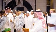 Katara General Manager, Prof. Dr. Khalid bin Ibrahim Al Sulaiti; Saudi Ambassador to Qatar H H Prince Mansour bin Khalid bin Abdullah Al Farhan Al Saud; and others view falcons on display on opening day of the Katara International Hunting and Falcons Exhibition yesterday. 