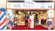 US Ambassador to Qatar H E Timmy Davis and CEO of Al Meera Yousef Ali Al Obaidan inaugurating ‘Discover America with a Fork and the Road’ campaign at an Al Meera Branch. 