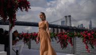 A model presents designs by US fashion designer Michael Kors during his New York Fashion Week runway show in the Brooklyn borough of New York City on September 11, 2023. (Photo by Ed Jones / AFP)