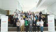 Dr. Javaid Sheikh (centre front row), Dr. Ravinder Mamtani (third right front row), Dr. Sohaila Cheema (third left front row), and other speakers and participants.