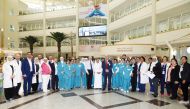 CEO of Al Ahli Hospital Khalid Al Emadi; Chief of Medical Staff Dr. Abdul Azim Hussain; and Director, Guest Safety and Quality, David Miller with nurses and officials during an event to mark Qatar Patient Safety Week 2023, yesterday. Pic: Salim Matramkot/The Peninsula