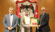 Katara General Manager, Prof. Dr. Khalid bin Ibrahim Al Sulaiti receiving a token of appreciation from the Union of Jordanian Publishers.