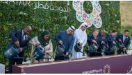 The Amir HH Sheikh Tamim bin Hamad Al Thani with other world leaders and officials during the opening ceremony of the Expo 2023 Doha theatrical presentation themed 'Green Desert, Better Environment' at the exhibition site in Al Bidda Park on October 2, 2023. 