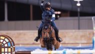 Qatari rider Faleh Suwead Al Ajami astride Crispo celebrates after winning final round of last season's Hathab Series, in this file photo.