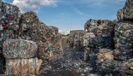 This picture shows plastic bottles at a Recycle Factory in the city of Megara near Athens, on May 26, 2023. (Photo by Angelos Tzortzinis / AFP)

