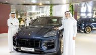 CEO of Porsche Centre Doha Salman Jassem Al Darwish (right) and Brand Manager of Porsche Centre Doha Ahed Dawood during the launch of new Cayenne in Doha. 