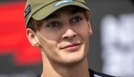 Mercedes' British driver George Russell listens in the TV pen at the Circuit of the Americas in Austin, Texas, on October 19, 2023, ahead of the United States Formula One Grand Prix. (Photo by Jim WATSON / AFP)