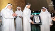 Minister of Municipality H E Dr. Abdullah bin Abdulaziz bin Turki Al Subaie and the Minister of Communications and Information Technology, H E Mohammed bin Ali Al Mannai pose with the Guinness World Record during the launch of the Smart Qatar TASMU Pavilion at Expo 2023.