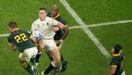 England's full-back Freddie Steward (2L) leaps for a high ball with South Africa's fly-half Handre Pollard (L) and South Africa's hooker Bongi Mbonambi (C) as South Africa's left wing Cheslin Kolbe (R) looks on during the France 2023 Rugby World Cup semi-final match between England and South Africa at the Stade de France in Saint-Denis, on the outskirts of Paris, on October 21, 2023. (Photo by Antonin THUILLIER / AFP)
