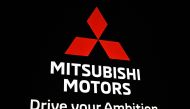 This file picture taken on October 23, 2019 shows the Mitsubishi Motors logo during the Tokyo Motor Show in Tokyo. Photo by Charly TRIBALLEAU / AFP