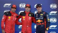 From left: Ferrari's Spanish driver Carlos Sainz Jr., Ferrari's Monegasque driver Charles Leclerc, and Red Bull Racing's Dutch driver Max Verstappen pose after the qualifying session session for the Formula One Mexico Grand Prix at the Hermanos Rodriguez racetrack in Mexico City on October 28, 2023. Photo by ALFREDO ESTRELLA / AFP