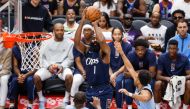 James Harden (top) of Los Angeles Clippers shoots during the 2023-2024 NBA regular season match between Memphis Grizzlies and Los Angeles Clippers in Los Angeles, the United States, on Nov. 12, 2023. (Photo by Ringo Chiu/Xinhua)
