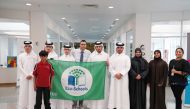 Awsaj Academy with their Eco-Schools Green Flag.