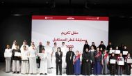 Minister of Education and Higher Education H E Buthaina bint Ali Al Jabr Al Nuaimi with official and winners of “Qatar Future” competition.