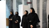 Minister of Social Development and Family H E Maryam bint Ali bin Nasser Al Misnad along with other officials during a panel discussion at Qatar University.