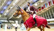 Rashid Towaim Al Marri celebrates astride Van Gallettana Z after winning the CSI1 Open class.  