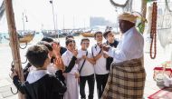 Students learn about the tools used in fishing and pearl diving.