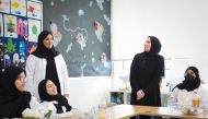 Minister of Education and Higher Education H E Buthaina bint Ali Al Jabr Al Nuaimi interacts with students and teachers at the Department of Special Education, Hind Bint Amr Al Ansariya Preparatory School for Girls.