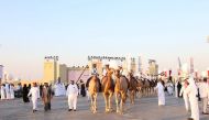 Camel riders participate in the opening ceremony of Darb Al Saai yesterday.