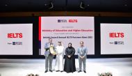 UK Ambassador to Qatar H E Jonathan Wilks (left) receives an award at the event.