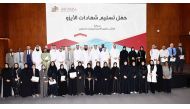 Qatar University President Dr. Omar Al Ansari and other officials at the event. 