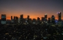 Buildings pictured during sunset in Jakarta, Indonesia. AFP file photo.