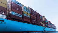 A side view of a fully loaded cargo container ship, owned by the Maersk Line, in the Red Sea.