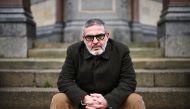 British-Palestinian plastic surgeon specialising in conflict injuries Ghassan Abu Sitta, poses for pictures in Victoria Park, east London, on January 7, 2024. (Photo by Henry Nicholls / AFP)