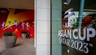 A sentinel guards an entrance of the Main Media Center (MMC) of the Asian Cup 2023 football tournament in Doha on January 9, 2024. (Photo by Jewel SAMAD / AFP)