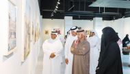 Prof. Dr. Khalid bin Ibrahim Al Sulaiti, General Manager of Cultural Village Foundation, Katara (second right) along with other officials and artist during the opening of “Taraab” exhibition.