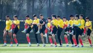 China players train in Doha ahead of their AFC Asian Cup 2023 opener against Tajikistan. Xinhua