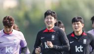 South Korea’s Son Heung-Min (centre) and Kim Min-jae (right) during a training session in Doha. PIC: KFA